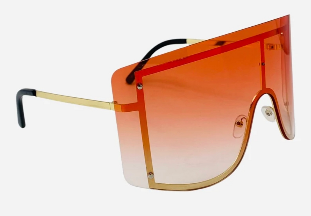 Rimless Two-Tone Shield Sunglasses by The Glam Vault in Orange